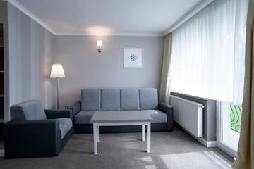 Фото номера Двухместный номер «Комфорт» с 2 отдельными кроватями Отель Hotel Niedźwiadek г. Вдзыдзе-Кишевске 7
